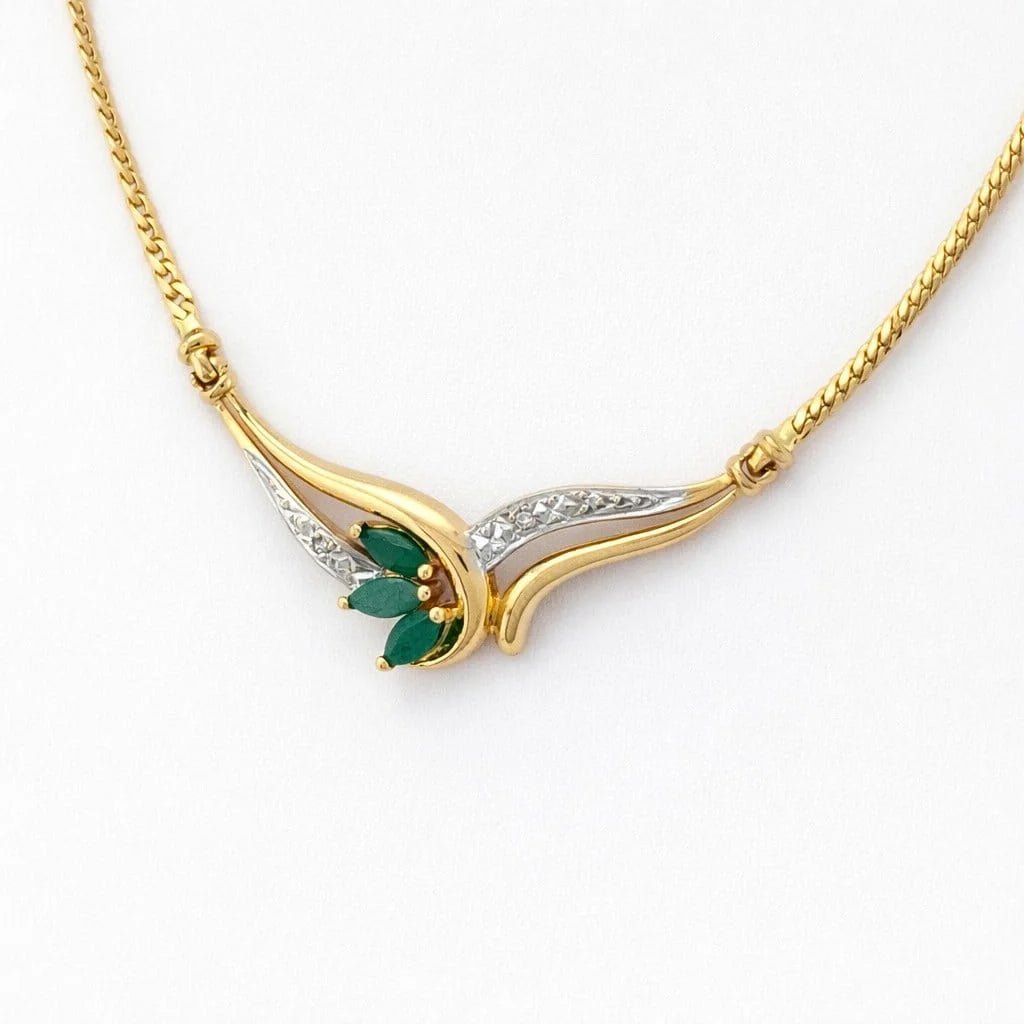 Collier Pendentif en or blanc, or jaune, émeraudes et diamants - Castafiore