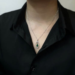 Collier Pendentif en or blanc, platine, émeraude et diamants - Castafiore