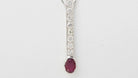 Collier pendentif en or blanc, rubis et diamants - Castafiore