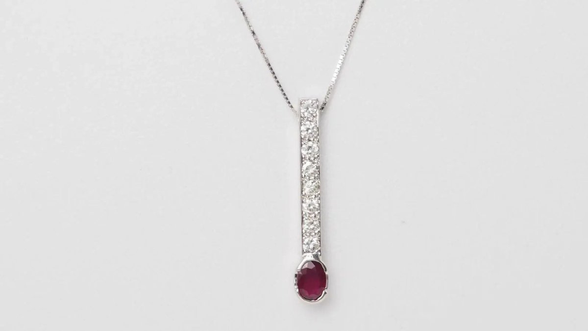 Collier pendentif en or blanc, rubis et diamants - Castafiore