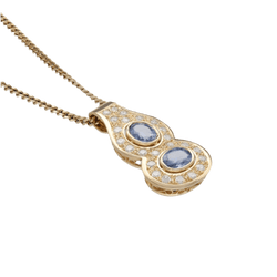 Collier pendentif en or jaune, saphirs et diamants - Castafiore