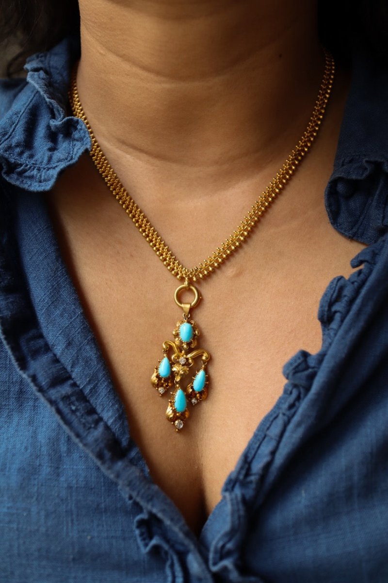 Collier Pendentif en or jaune, turquoise, et diamants - Castafiore