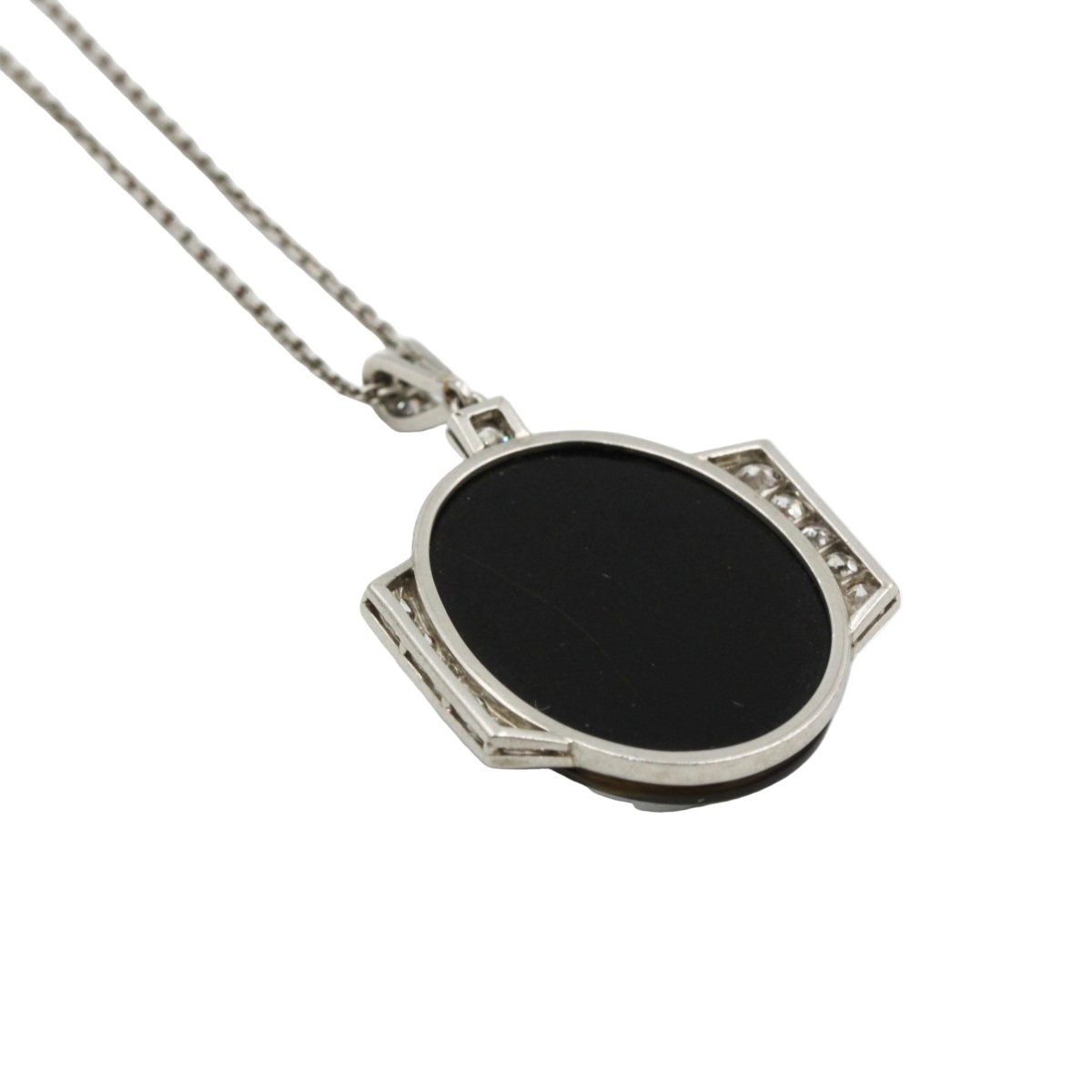 Collier Pendentif en platine, onyx et diamants - Castafiore