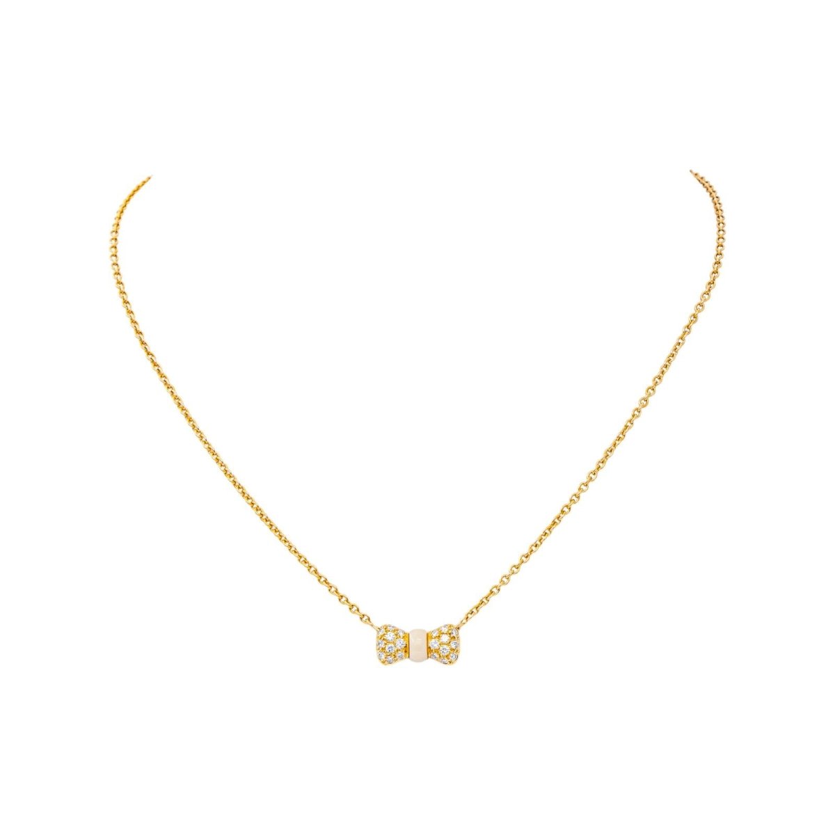 Collier Pendentif VAN CLEEF & ARPELS "Noeud" en or jaune, corail et diamants - Castafiore