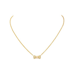 Collier Pendentif VAN CLEEF & ARPELS "Noeud" en or jaune, corail et diamants - Castafiore