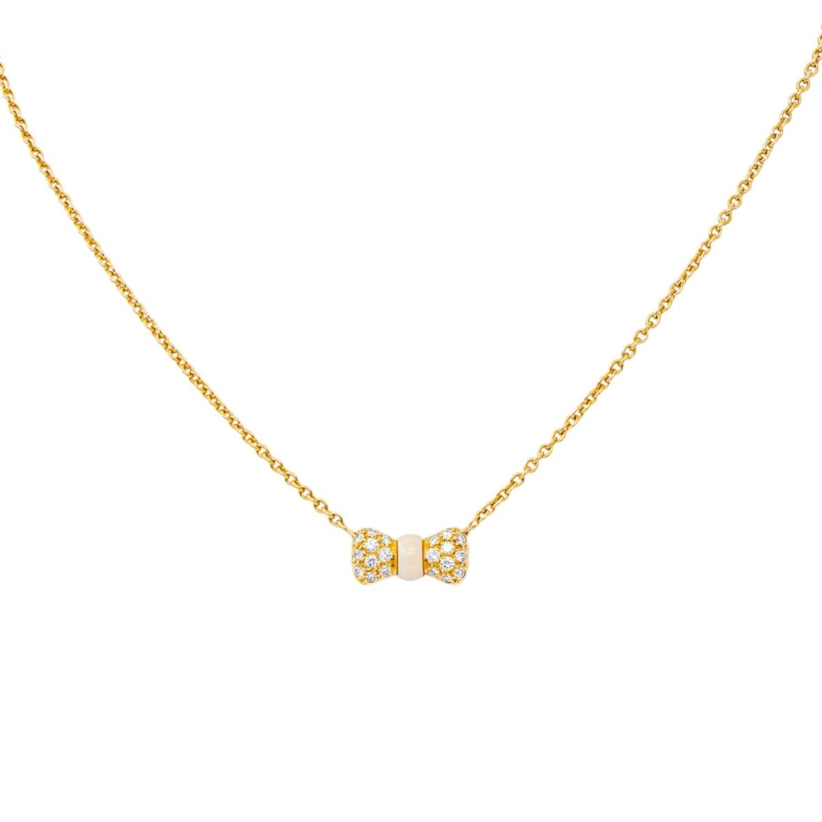 Collier Pendentif VAN CLEEF & ARPELS "Noeud" en or jaune, corail et diamants - Castafiore