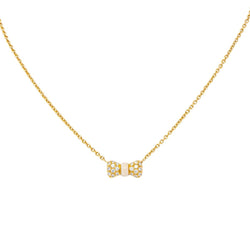 Collier Pendentif VAN CLEEF & ARPELS "Noeud" en or jaune, corail et diamants - Castafiore