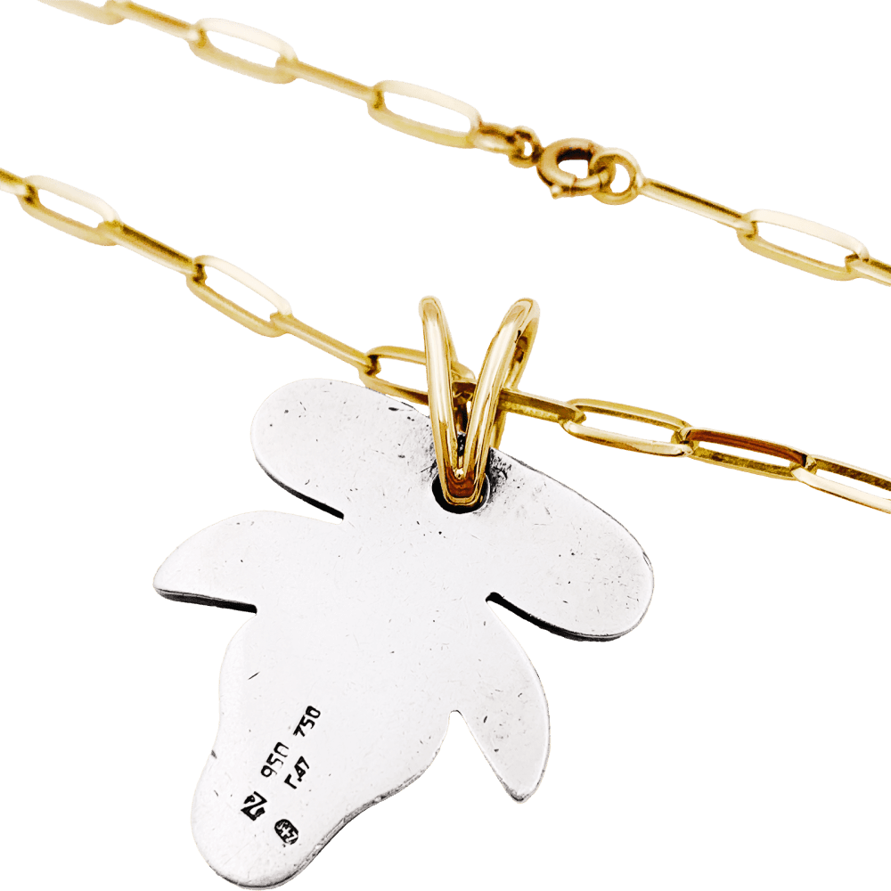 Zolotas pendant, silver, yellow gold.