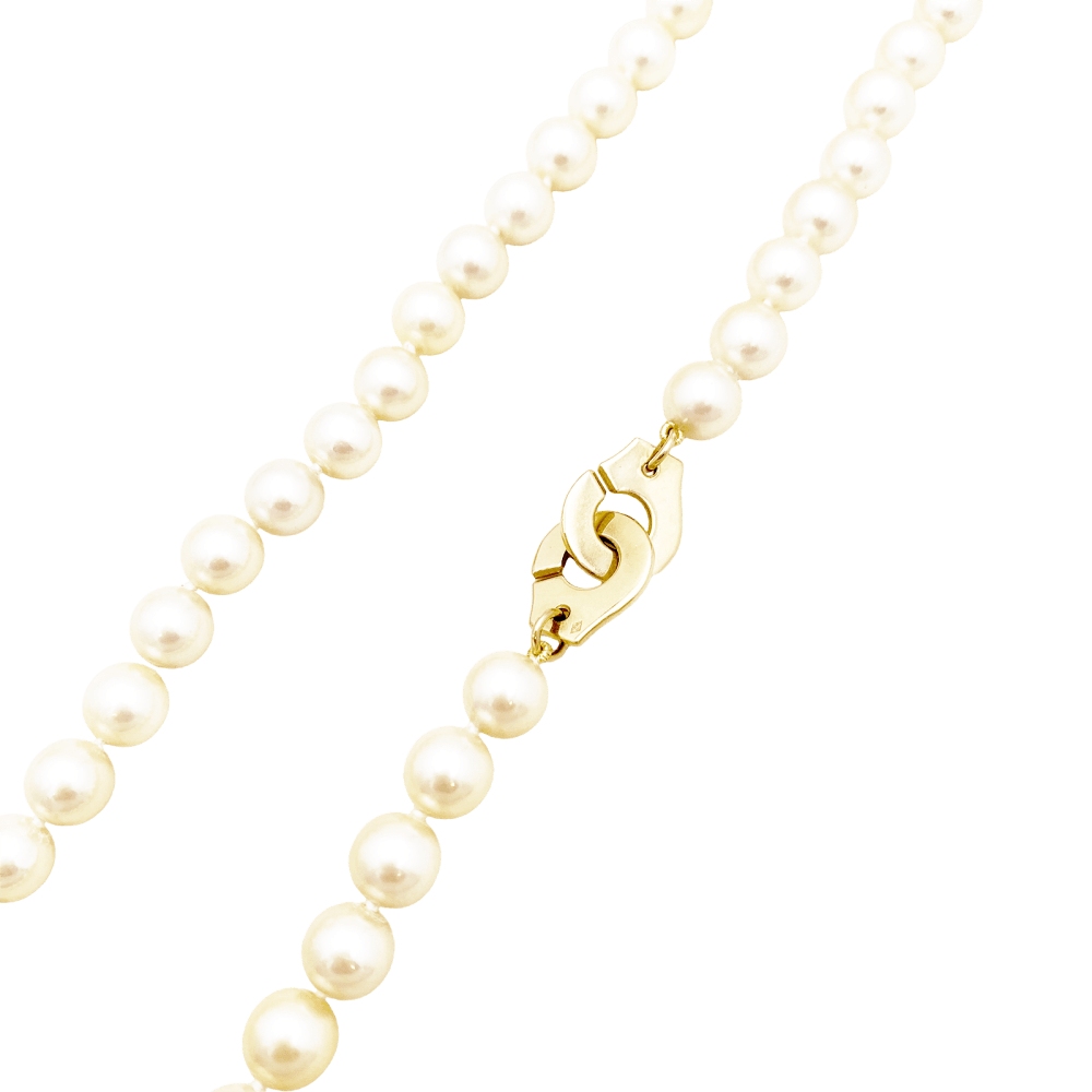 Collier Perles DINH VAN "Menottes R12" en or jaune et perles - Castafiore