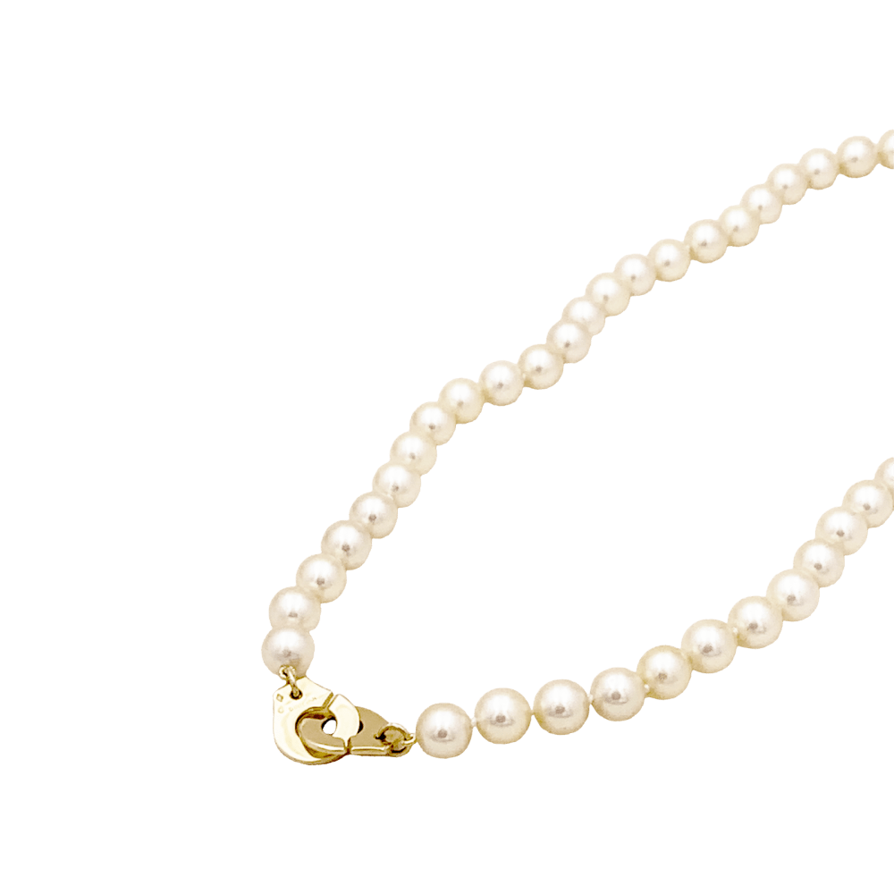 Collier Perles DINH VAN "Menottes R12" en or jaune et perles - Castafiore