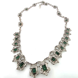 Collier Plastron en platine, émeraudes et diamants - Castafiore