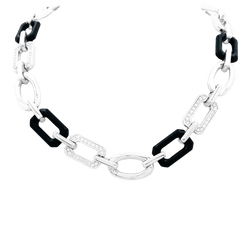 Collier Ras de Cou CHANEL "Première" en or blanc, onyx et diamants - Castafiore
