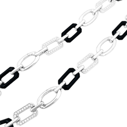 Collier Ras de Cou CHANEL "Première" en or blanc, onyx et diamants - Castafiore