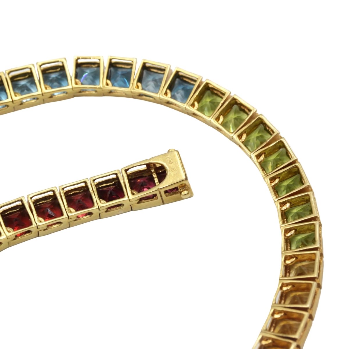 Collier Ras de Cou HANS STERN "Rainbow" en or jaune, grenats, citrines, péridots, aigues - marines, cordiérites et améthystes - Castafiore