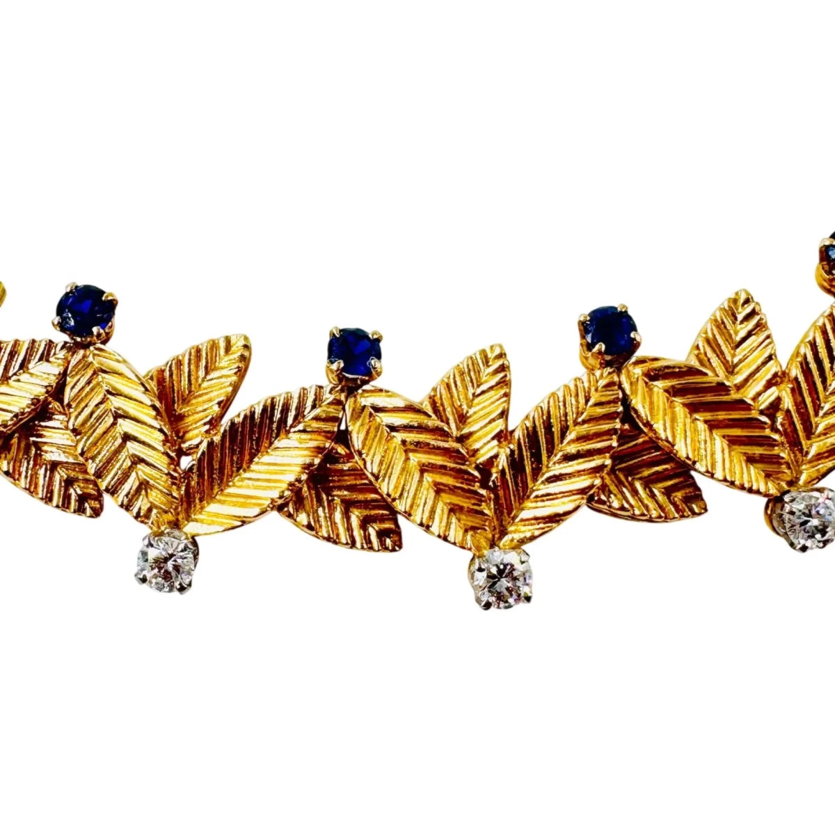 Collier Ras de Cou VAN CLEEF & ARPELS Feuilles en or jaune, saphirs et diamants - Castafiore