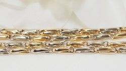 Collier Sautoir Cartier en or jaune grain d' avoine - Castafiore