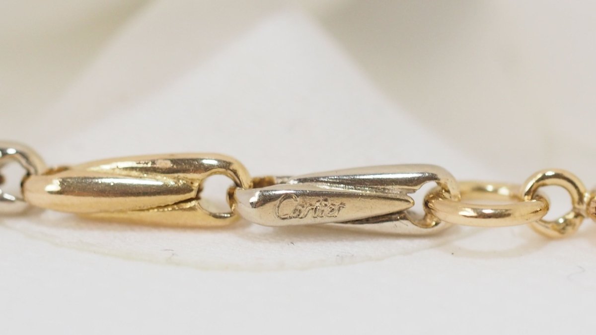 Collier Sautoir Cartier en or jaune grain d' avoine - Castafiore