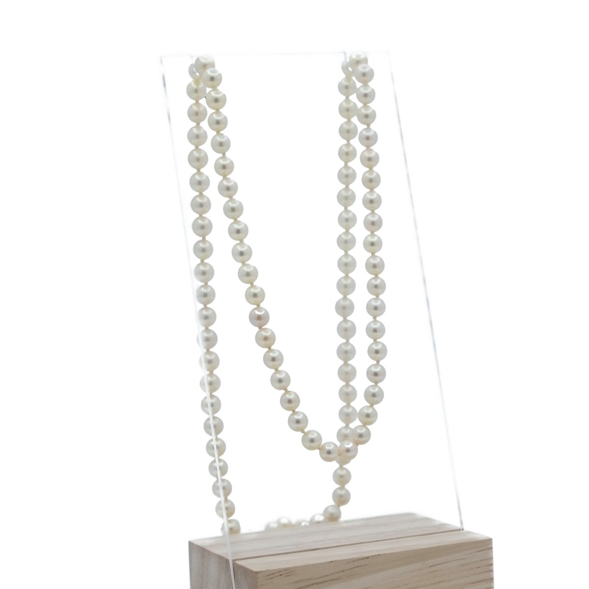 Collier sautoir en or jaune et perles - Castafiore