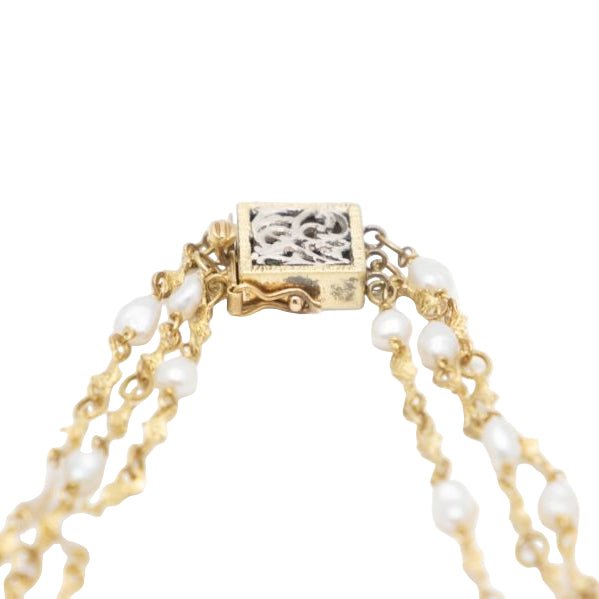 Collier Sautoir en or jaune, or blanc et perles - Castafiore