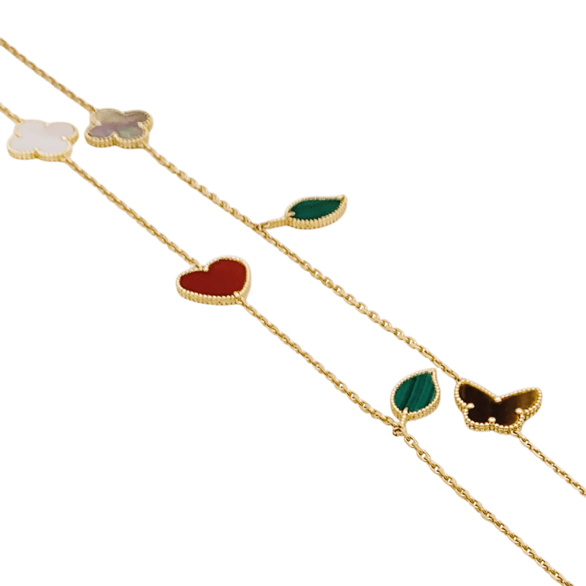 Collier - Sautoir VAN CLEEF & ARPELS "Lucky Alhambra", or jaune, cornaline, malachite, oeil de tigre, nacre - Castafiore