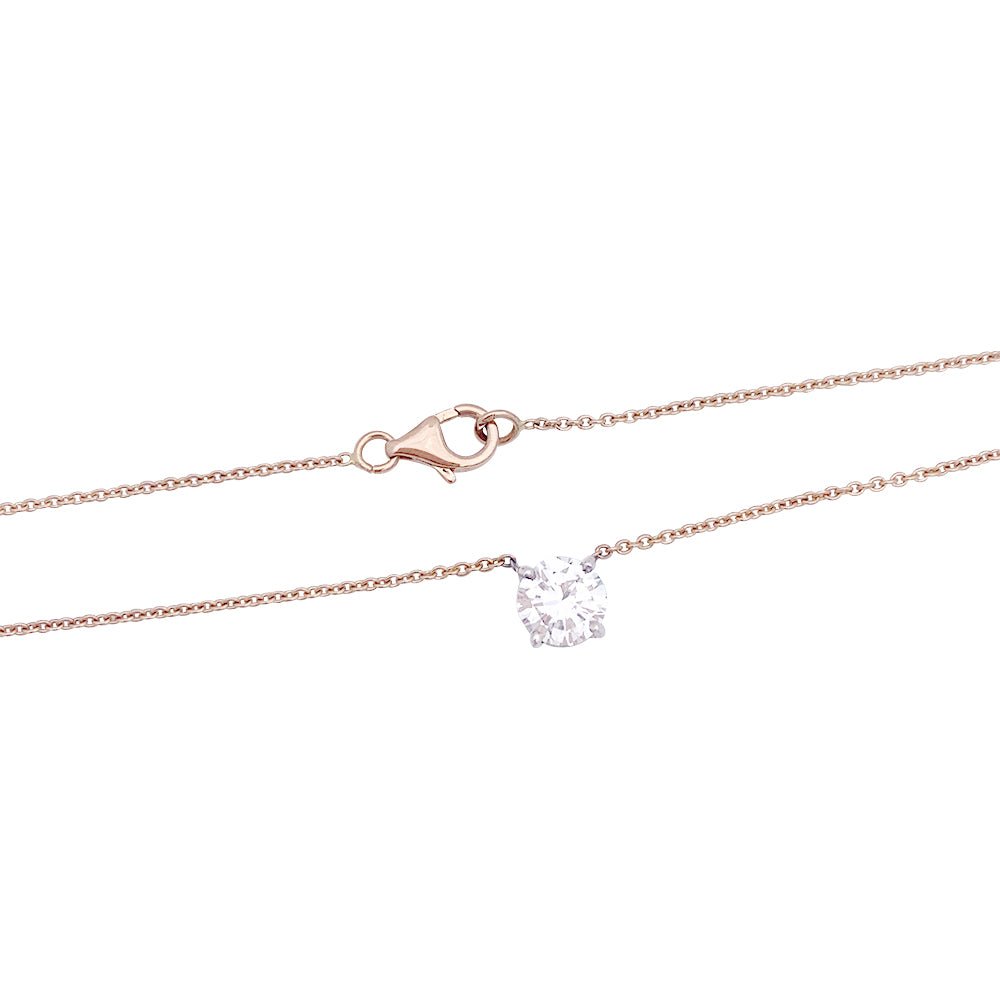 Collier solitaire deux ors, diamants. - Castafiore