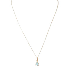 Collier solitaire en or jaune et topaze bleue - Castafiore