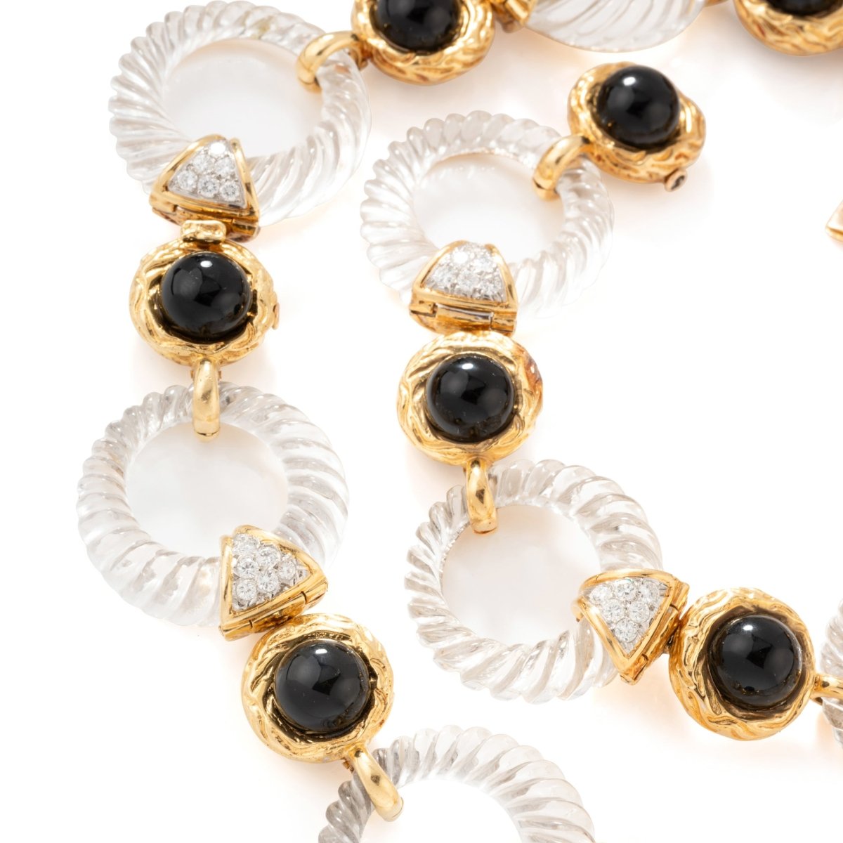 Collier transformable BOUCHERON en or jaune, onyx, cristal de roche et diamants - Castafiore