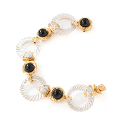 Collier transformable BOUCHERON en or jaune, onyx, cristal de roche et diamants - Castafiore
