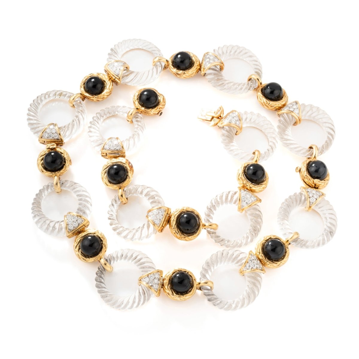 Collier transformable BOUCHERON en or jaune, onyx, cristal de roche et diamants - Castafiore