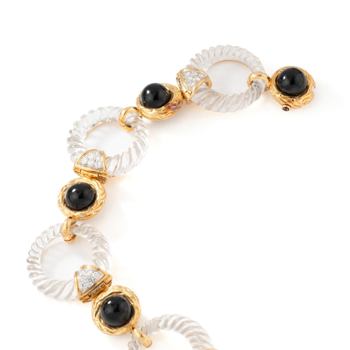 Collier transformable BOUCHERON en or jaune, onyx, cristal de roche et diamants - Castafiore