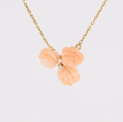 Necklace trio of angel-skin coral roses and diamond yellow gold