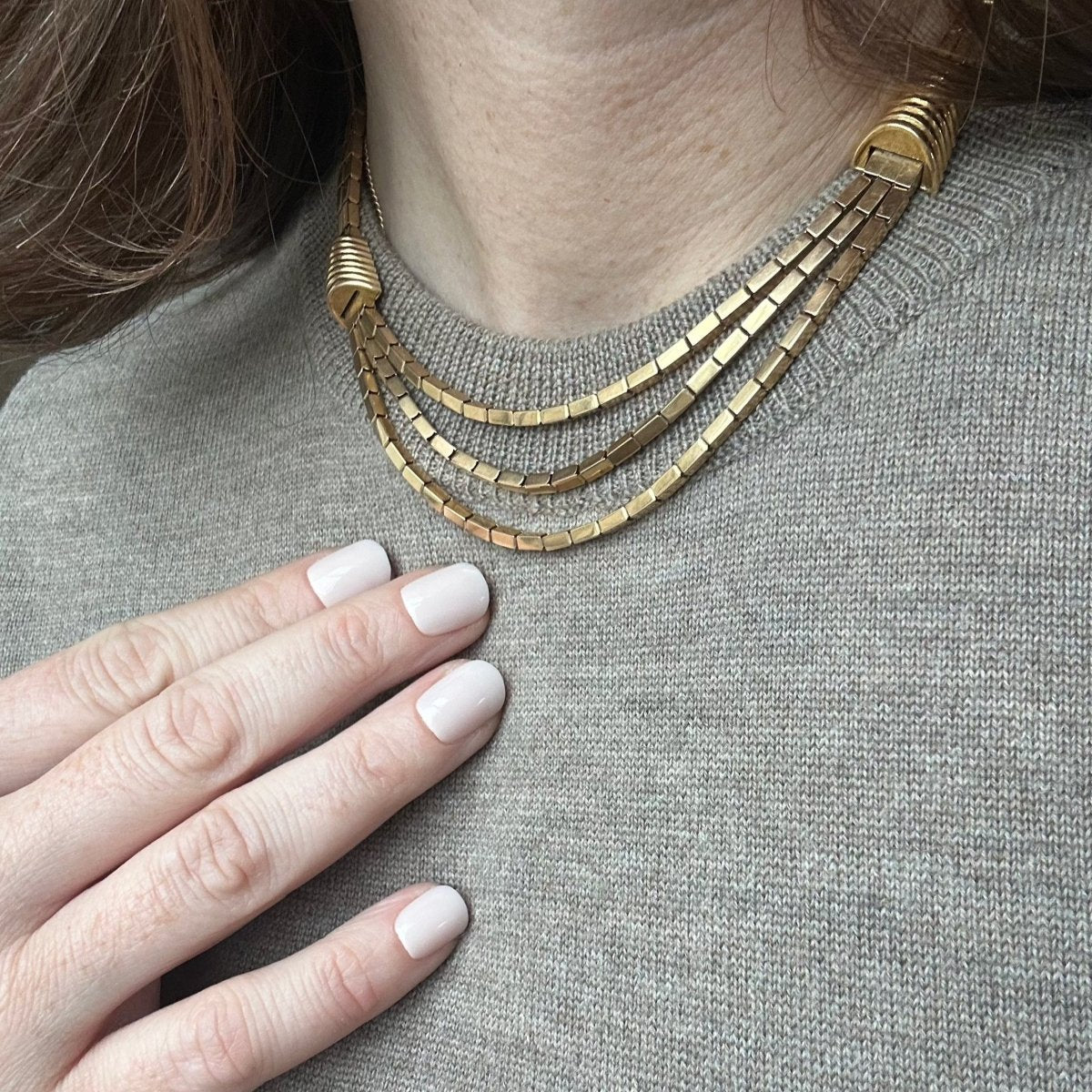 Necklace three-row articulated gold