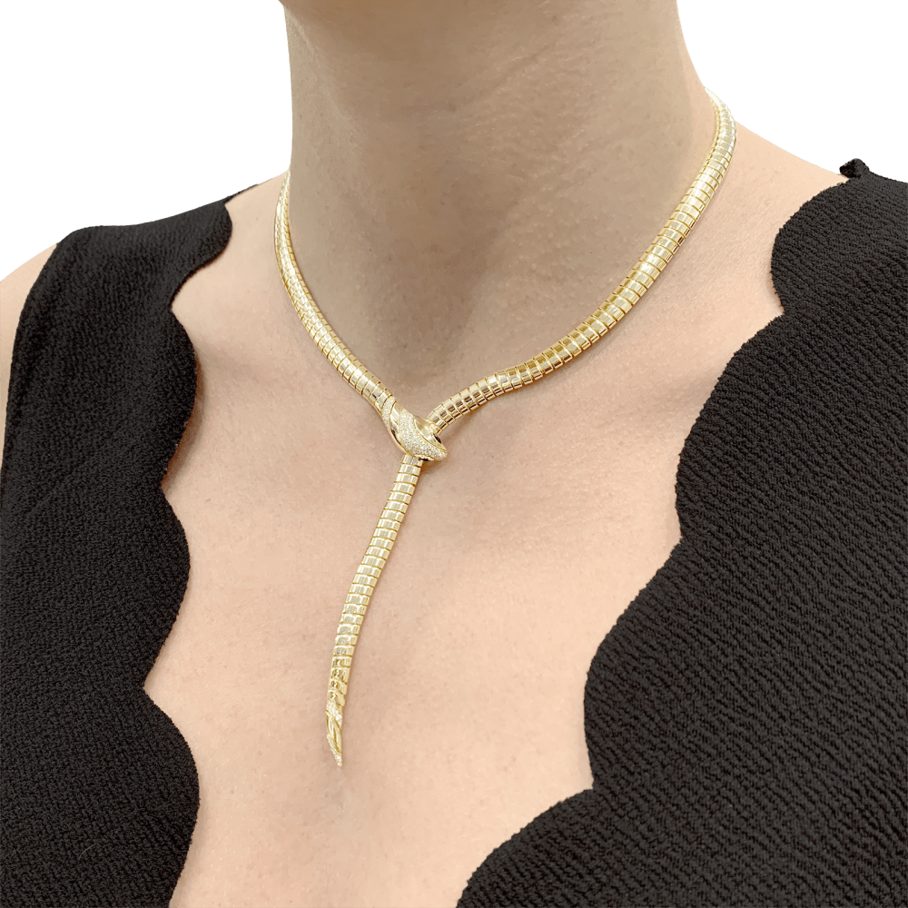 Collier Tubogas BULGARI "Serpenti Tubogas" en or jaune, onyx et diamants - Castafiore