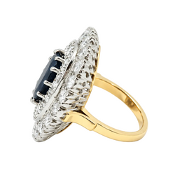 Pompadour Ring in white gold, yellow gold, sapphire, and diamonds