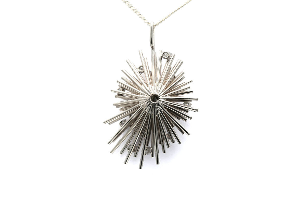Pendentif en or blanc, émeraudes et diamants