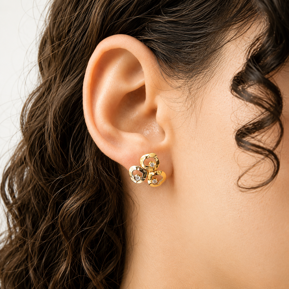 CHOPARD "Happy Curve" Earrings in white gold, yellow gold, rose gold, and diamonds