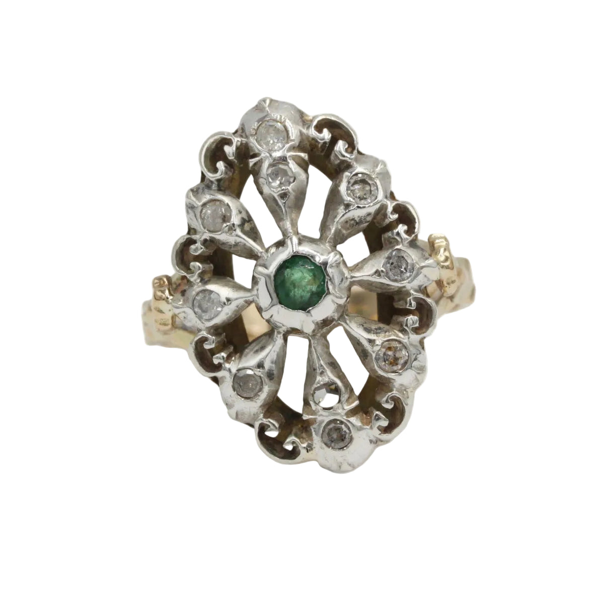 Ring in yellow gold, silver, emerald, and diamonds