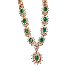Yellow gold necklace with emeralds and diamonds
