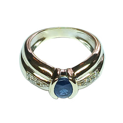 White Gold Solitaire Ring with Sapphire and Diamonds
