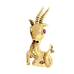 Broche-clip, "Capricorne", or jaune, rubis, saphirs.