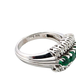 White gold ring with emeralds and diamonds