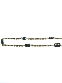 Rose gold long necklace with Tahitian pearls.