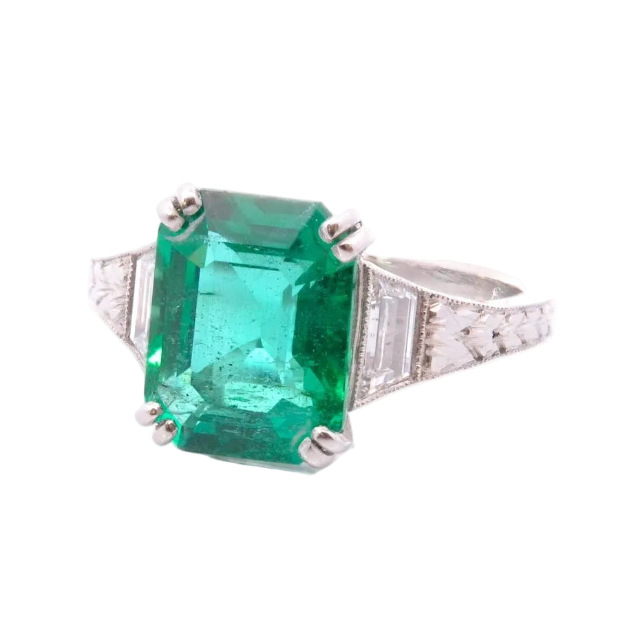 Trilogy Ring in Platinum, Emerald, and Diamonds