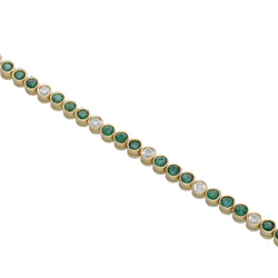 "Ligne" Bracelet in Yellow Gold, Emeralds, and Diamonds