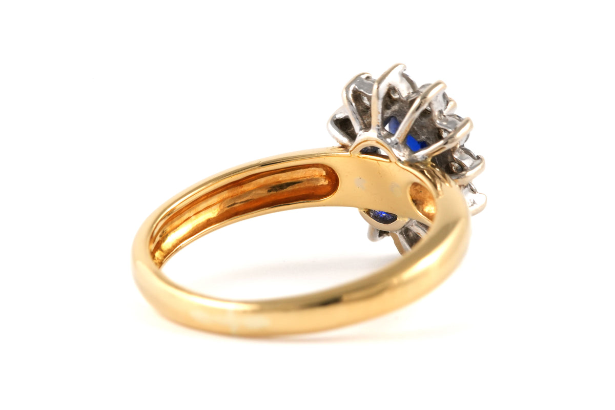 Bague Marguerite en or jaune, saphir et zirconiums