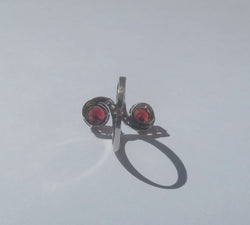 "Toi et Moi" Ring with 19th-Century Swirls, Garnets, Diamonds, and Platinum