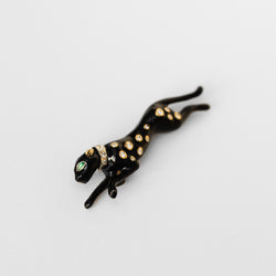 Broche panthère André VASSORT en or jaune et émail noir