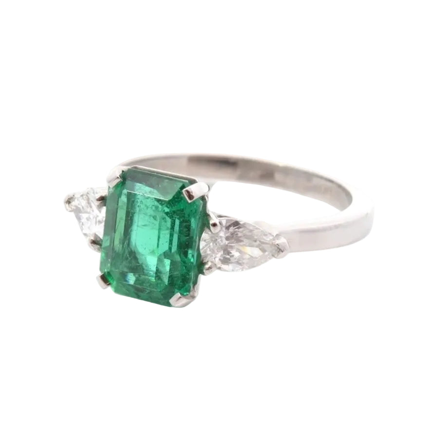 Trilogy Ring in Platinum, Emerald, and Diamonds