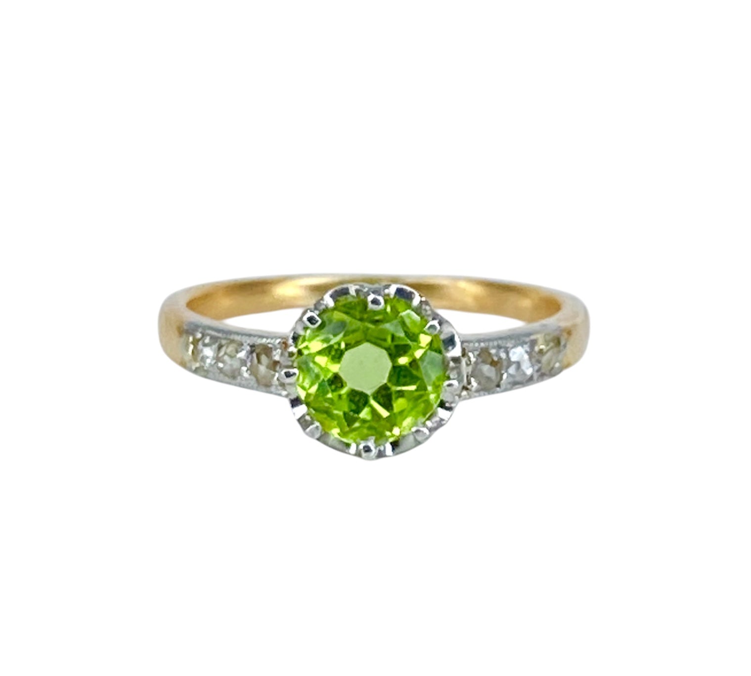 Ring in gold, peridot and diamonds circa 1900