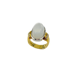 Solitaire Ring in yellow gold, white gold, moonstone, and diamonds